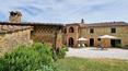 Toscana Immobiliare - Farmhouse with annexe and land for sale in Val d'Orcia