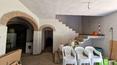 Toscana Immobiliare - Villa para reformar con anexo, parque y piscina en venta en una ladera en Arezzo, Toscana