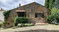 Toscana Immobiliare - Luxury Villa for sale in Tuscany with stone restored farmhouse, gardens, church, swimming pool. Dominant position on the Val Di Chiana countryside
