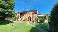 Toscana Immobiliare - The brick facade of the farmhouse for sale blends perfectly with everything around it