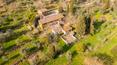 Toscana Immobiliare - This property overlooking the entire valley is composed of three buildings built entirely of stone