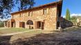Toscana Immobiliare - Farmhouse with panoramic views, garden, park and outbuildings for sale in Tuscany