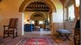 Toscana Immobiliare - Luxury farmhouse with ancient tower, vineyard, olive grove and swimming pool for sale in a panoramic position in Monte San Savino, Arezzo, Tuscany