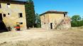 Toscana Immobiliare - Property in need of renovation with a farmhouse, annexes and 2 ha of land for sale in Tuscany