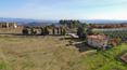 Toscana Immobiliare - Casale in pietra con loggia e vista panoramica in vendita in Toscana