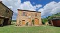 Toscana Immobiliare - In Tuscany, between Siena and Arezzo for sale country house with land and vineyard. Typical Tuscan property for sale with 2 farmhouses