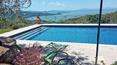 Toscana Immobiliare - The property, immersed in the enchanting Umbrian landscape, offers an unparalleled panoramic view of Lake Trasimeno
