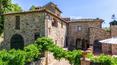 Toscana Immobiliare - Restored farmhouse with annexes, panoramic pool and 18 ha of land with vineyard and olive grove in Sinalunga, Tuscany