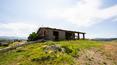 Toscana Immobiliare - Zum Anwesen gehört ein im Bau befindliches Haus mit einem herrlichen Portikus mit Panoramablick auf den darunter liegenden Weinberg