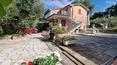 Toscana Immobiliare - The property is completed by 1 ha of land with olive grove, vineyard and garden overlooking the lake