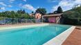 Toscana Immobiliare -  Villa con dépendance, piscina e 1 ha di terreno con vigneto e oliveto in vendita in Umbria