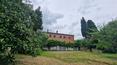Toscana Immobiliare - Ferme restaurée, entourée d'un hectare de terrain avec oliveraie, à vendre à Bettolle, Sinalunga, Toscane