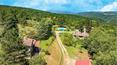 Toscana Immobiliare - Typical Tuscan estate immersed in a beautiful natural setting.
