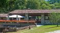 Toscana Immobiliare - Typical Tuscan estate immersed in a beautiful natural setting.