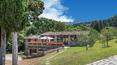 Toscana Immobiliare - Typical Tuscan estate immersed in a beautiful natural setting.