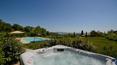 Toscana Immobiliare - Luxury estate with two villas, a wooden annexe and a 1.5 ha private park with swimming pool for sale in the province of Grosseto, Tuscany.
