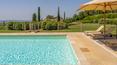 Toscana Immobiliare - Luxury estate with two villas, a wooden annexe and a 1.5 ha private park with swimming pool for sale in the province of Grosseto, Tuscany.