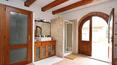 Toscana Immobiliare - Charming farmhouse with two flats, annexes and 8 ha of land for sale in the Tuscan hills