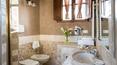 Toscana Immobiliare - The manor villa is characterised by its imposing brick façade and the evocative staircase with loggia