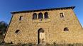 Toscana Immobiliare - Ancient farmhouse with outbuilding, annexes and 7 hectares of land for sale a few minutes from Arezzo