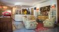 Toscana Immobiliare - The surrounding garden features panoramic terraces, a swimming pool with solarium and a tennis court