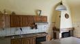 Toscana Immobiliare - The farmhouse in need of renovation is located within walking distance of a Tuscan village in the municipality of Sinalunga