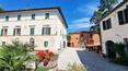 Toscana Immobiliare - Komplex mit Villa, Bauernhaus, Nebengebäuden, Garten und Land in der Toskana