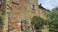Toscana Immobiliare - Portion of a 13th-century farmhouse with garden and breathtaking views of the medieval town of Arezzo, in Tuscany