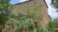 Toscana Immobiliare - Porzione di casale del XIII secolo con giardino e vista mozzafiato sulla città medievale di Arezzo, in Toscana