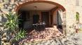 Toscana Immobiliare - The farmhouse features exposed Tuscan sandstone, antique wooden beams and red terracotta floors