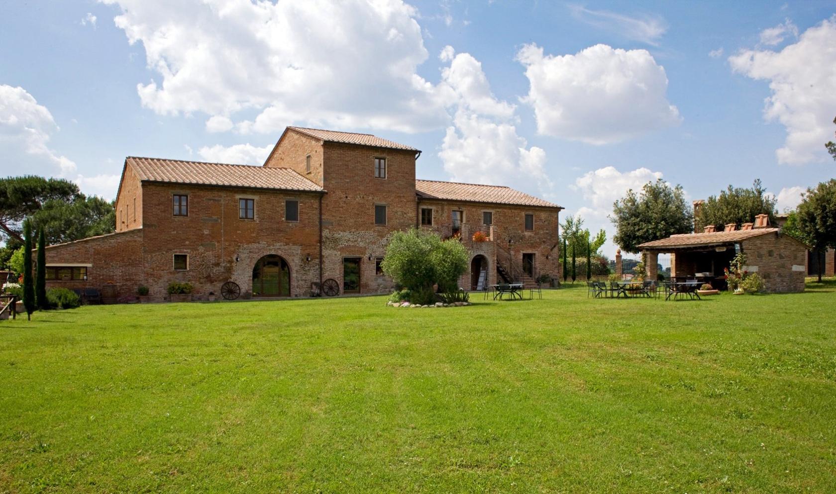 Toscana Immobiliare - Front view of the Holiday farm estate on sale in Sinalunga, Siena.