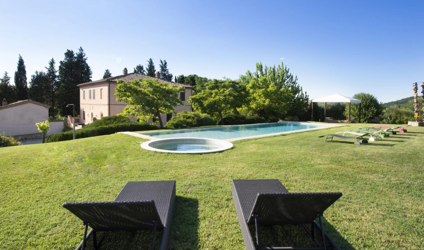 Toscana Immobiliare - Luxury villa with pool for sale on the Tuscan hills in Montalcino